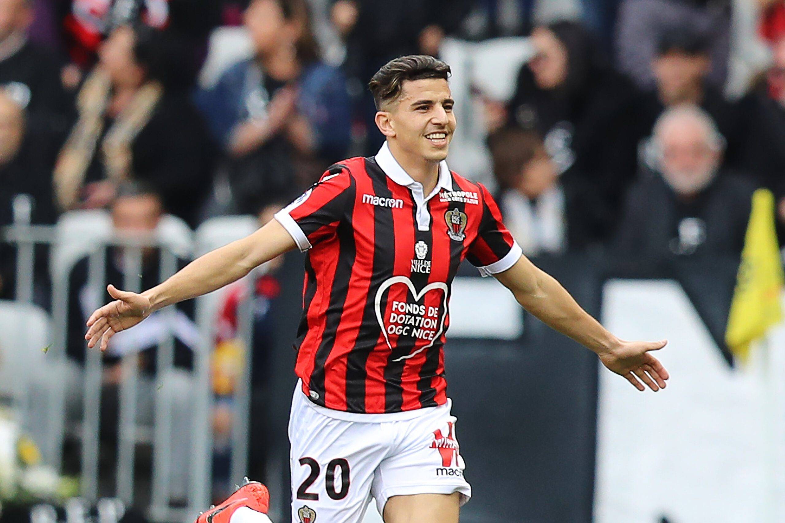 VIDEO : Un défenseur algérien "insulte" un attaquant marocain... Nice's Algerian defender Youcef Atal celebrates afte scoring a goal during the French L1 football match between Nice (OGCN) and Strasbourg (RCSA) on March 3, 2019, at the Allianz Riviera stadium in Nice, southeastern France. (Photo by VALERY HACHE / AFP) (Photo credit should read VALERY HACHE/AFP/Getty Images)