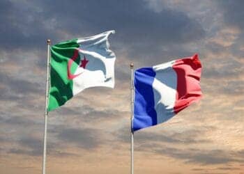 Beautiful national state flags of France and Algeria together at the sky background. 3D artwork concept.; Shutterstock ID 1848066196; purchase_order: -; job: -; client: -; other: -
