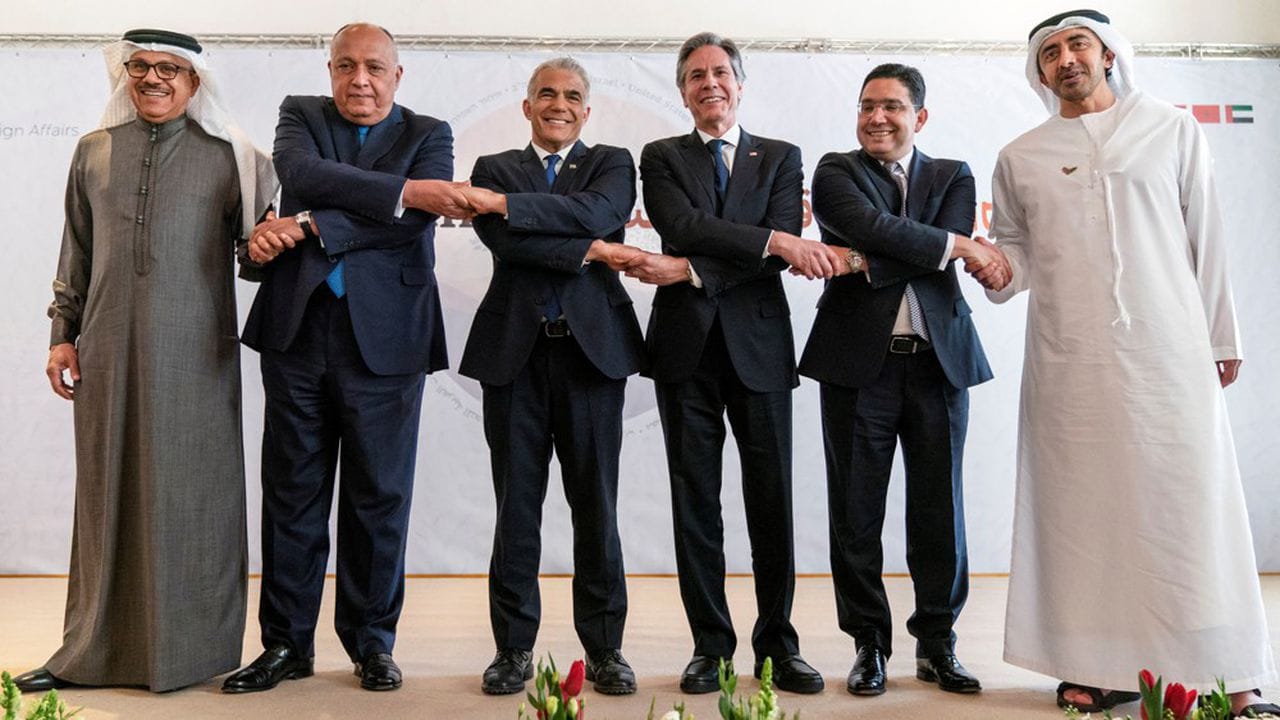 Bahrain's Foreign Minister Abdullatif bin Rashid al-Zayani, Egypt's Foreign Minister Sameh Shoukry, Israel's Foreign Minister Yair Lapid, U.S. Secretary of State Antony Blinken, Morocco's Foreign Minister Nasser Bourita and United Arab Emirates' Foreign Minister Sheikh Abdullah bin Zayed Al Nahyan pose for a photograph during the Negev Summit in Sde Boker, Israel March 28, 2022. Jacquelyn Martin/Pool via REUTERS