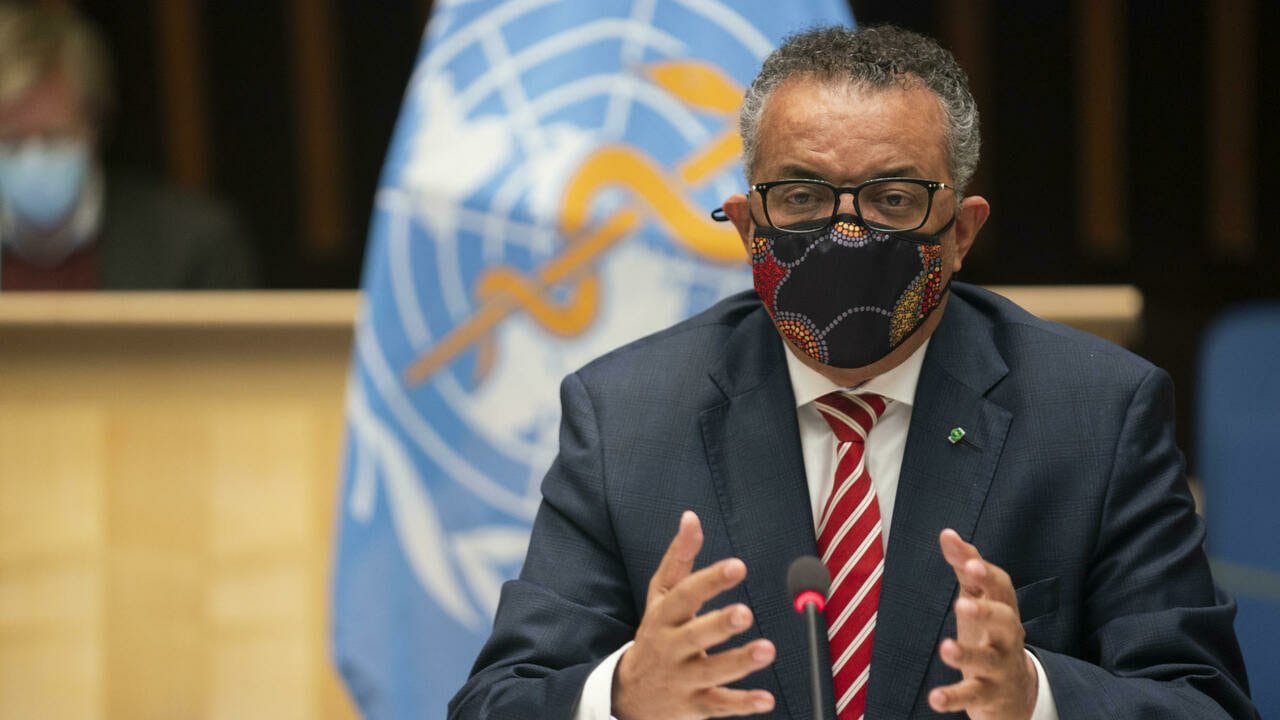 This handout picture taken and released by the World Health Organization on October 5, 2020 shows World Health Organization (WHO) Director-General Tedros Adhanom Ghebreyesus wearing a protective face mask attending a WHO executive board holds special session on the Covid-19 response at the health agency's hesdquarters in Geneva. - The WHO estimated Monday that 10 percent of the world has been infected by the new coronavirus -- way more than has been recorded -- as it mulled speeding up internal reforms. (Photo by Christopher Black / World Health Organization / AFP) / RESTRICTED TO EDITORIAL USE - MANDATORY CREDIT "AFP PHOTO / WORLD HEALTH ORGANIZATION / CHRISTOPHER BLACK" - NO MARKETING NO ADVERTISING CAMPAIGNS - DISTRIBUTED AS A SERVICE TO CLIENTS