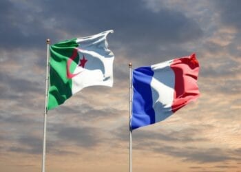 Beautiful national state flags of France and Algeria together at the sky background. 3D artwork concept.; Shutterstock ID 1848066196; purchase_order: -; job: -; client: -; other: -