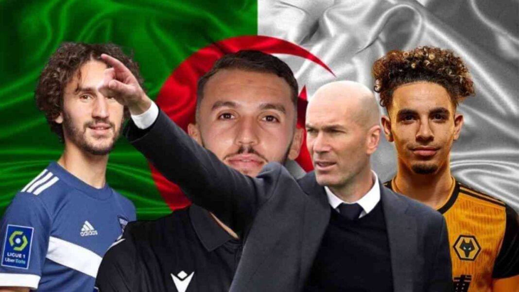 Zidane rejette l’offre de l’Algérie et choisit l’OM Trois joueurs de football algériens et un arbitre devant le drapeau algérien.