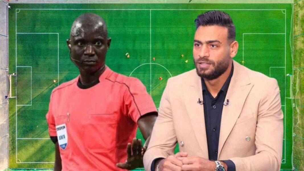 Les graves accusations de Gabaski : Je vous jure avant un match Gassama nous a dit ça… Deux hommes, un arbitre et un analyste, devant un terrain de football.