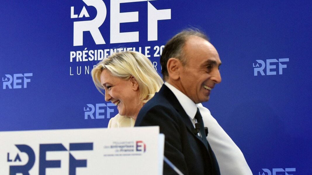 Présidentielle en France : «j’appelle mes électeurs à voter Marine Le Pen », Zemmour Deux personnes souriantes lors d'un événement politique à La Réunion.