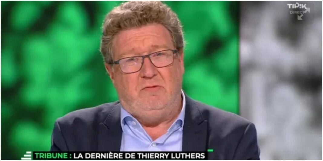 Incroyable : Un ancien joueur devenu consultant avoue un viol en direct à la télé… Homme en interview avec lunettes et expression sérieuse.