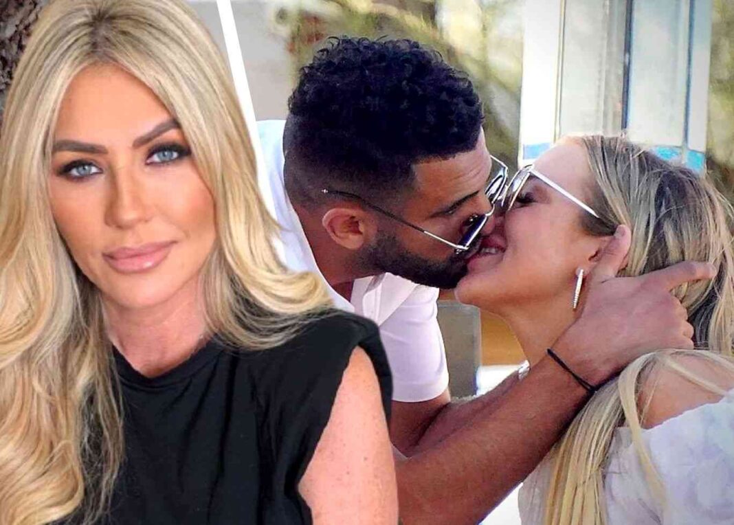 Taylor Ward annonce le sexe de leur bébé Couple s'embrassant tendrement lors d'une réunion en plein air.