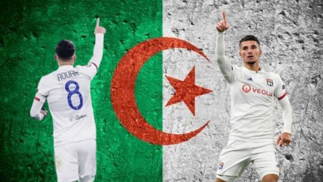 Houssem Aouar célèbre avec le drapeau algérien en arrière-plan.