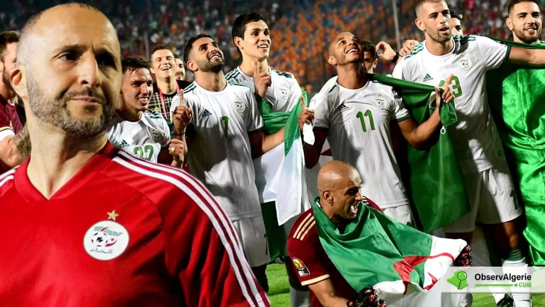 Affaire Gassama/Algérie – Cameroun: Enfin la décision de la FIFA vient de tomber Les joueurs algériens célèbrent leur victoire avec le drapeau national.