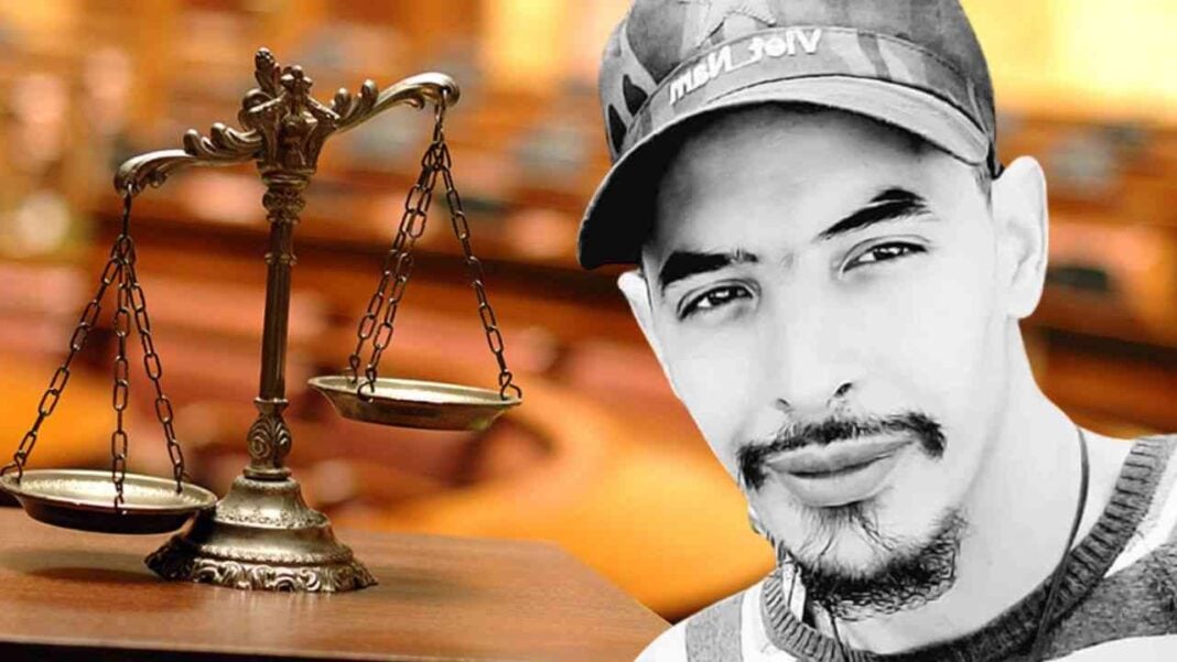 Affaire Djamel Bensmail : 102 nouveaux accusés comparaissent devant le juge Jeune homme portant un chapeau, symbole de justice et d'équité.