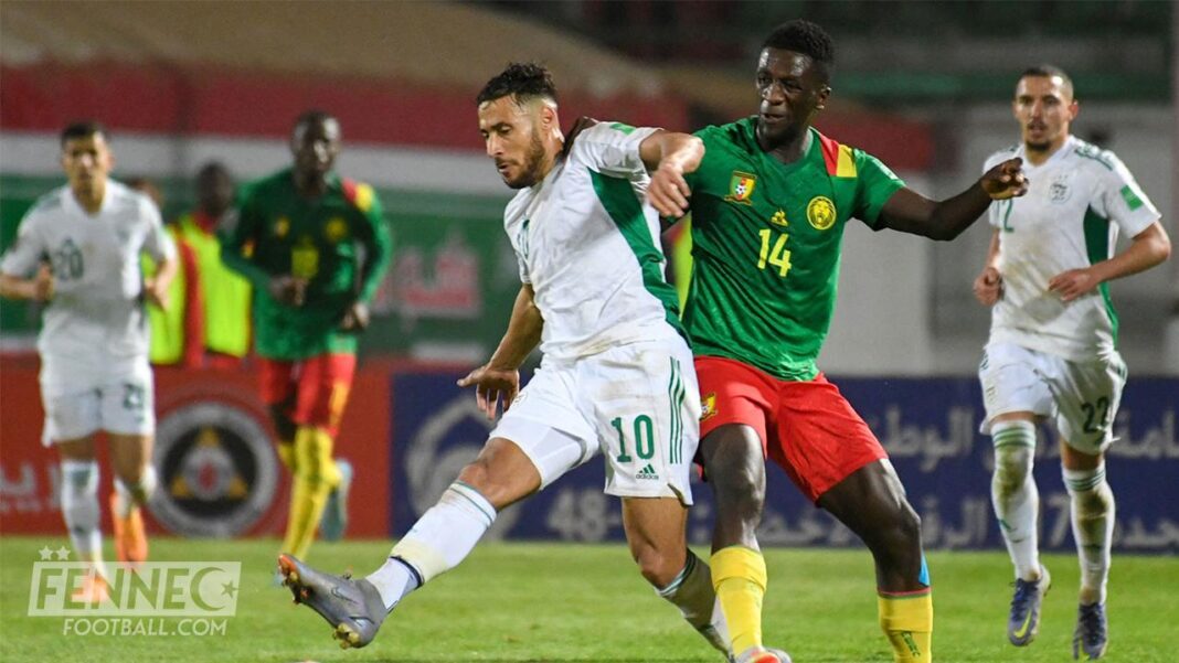 Enfin le match Algérie vs Cameroun aura lieu le… ! Joueur algérien et camerounais en duel lors du match.