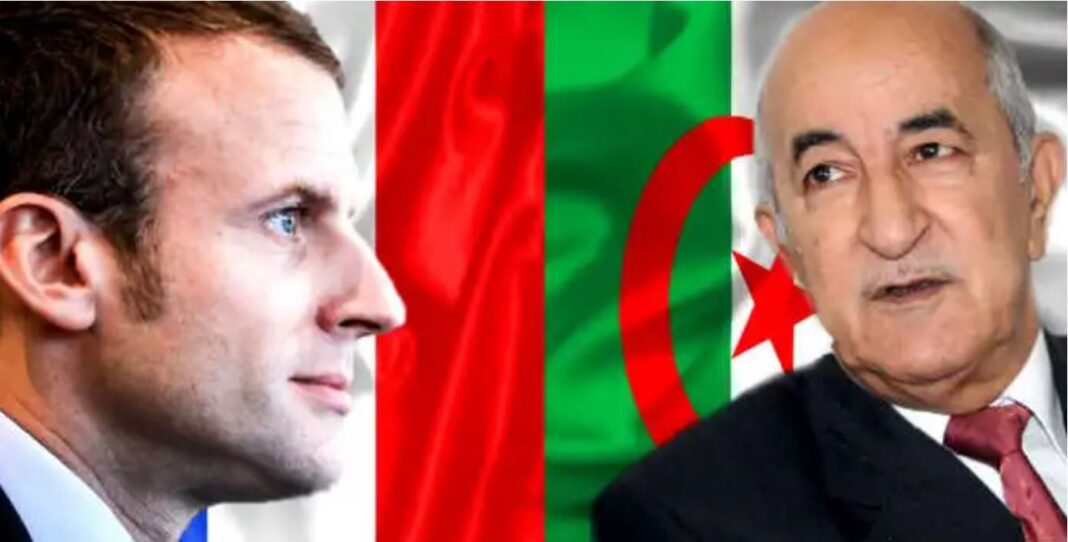 Encore le report de la visite de Tebboune en France Macron et le président algérien lors d'une rencontre officielle.