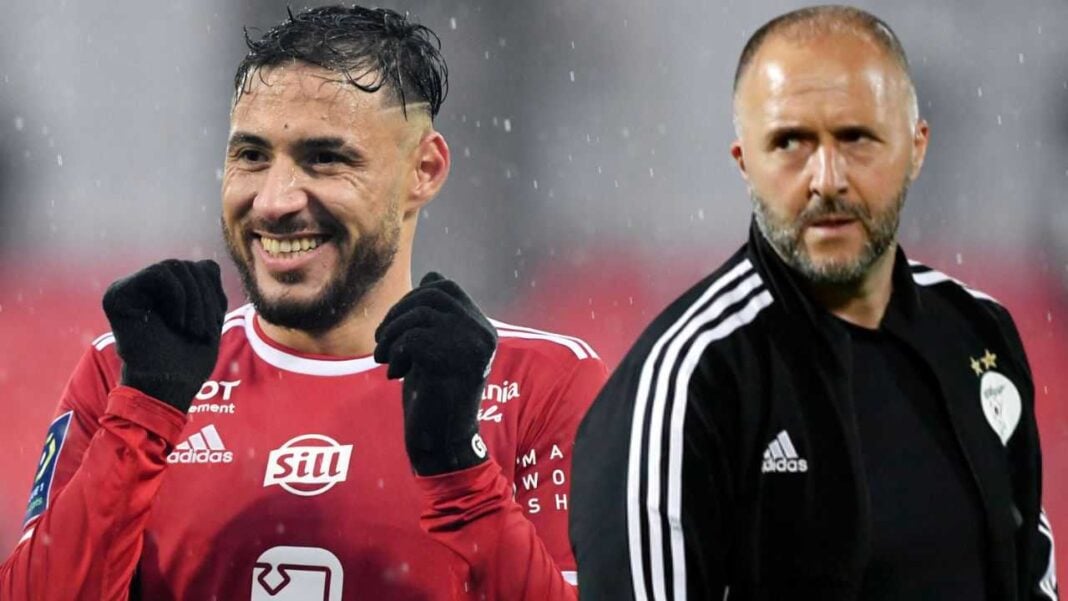 Équipe d’Algérie : Belmadi à propos de Belaïli à Brest Belaïli souriant en tenue de football sous la pluie.