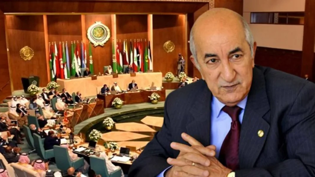 Echec au sommet arabe : l’Algérie tente-elle de rebondir avec un nouveau sommet ? Homme politique algérien lors d'un sommet arabe, discussion sérieuse.