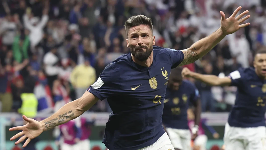 France Maroc : Découvrez l’historique des confrontations entre ces deux équipes Footballeur français célébrant un but lors d'un match.