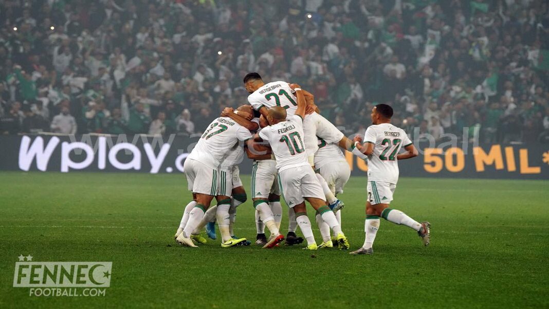 L’Algérie affronte le Sénégal en match amical le… Joueurs algériens célébrant un but lors d'un match amical contre le Sénégal.