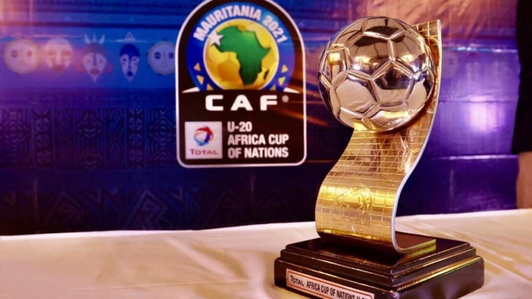 CAN U20 : voici le tirage complet Trophée de la Coupe d'Afrique U20 avec logo CAF et ballon doré.