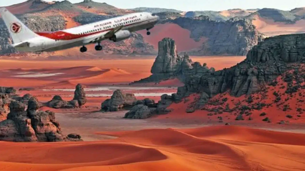 Avion d'Air Algérie sur le désert de Djanet Avion d'Air Algérie survole le désert de Djanet au coucher du soleil.