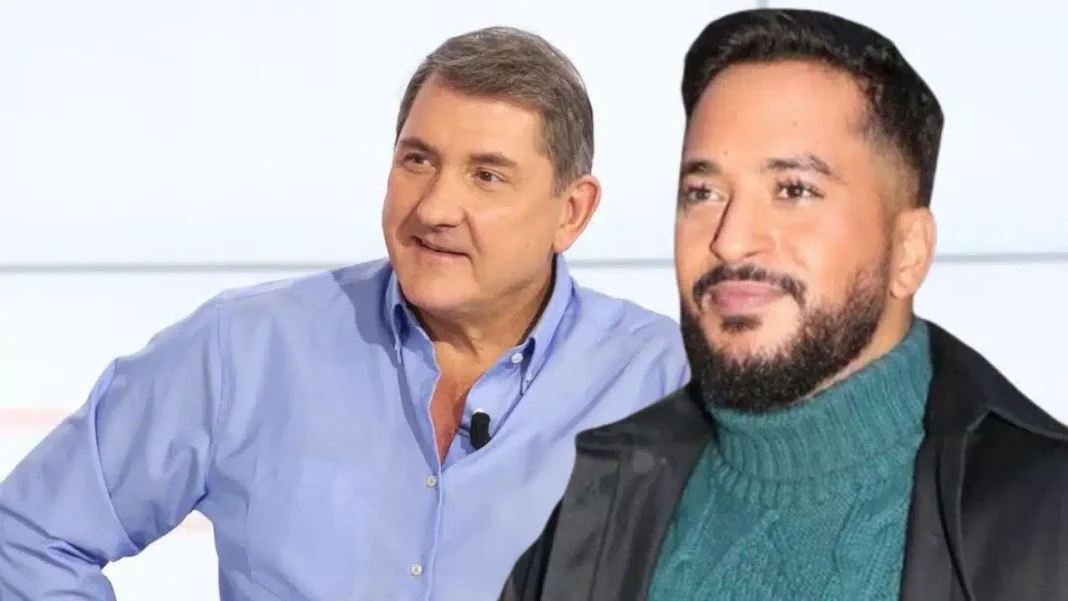 Slimane et Yves Calvi lors d'une émission télévisée.