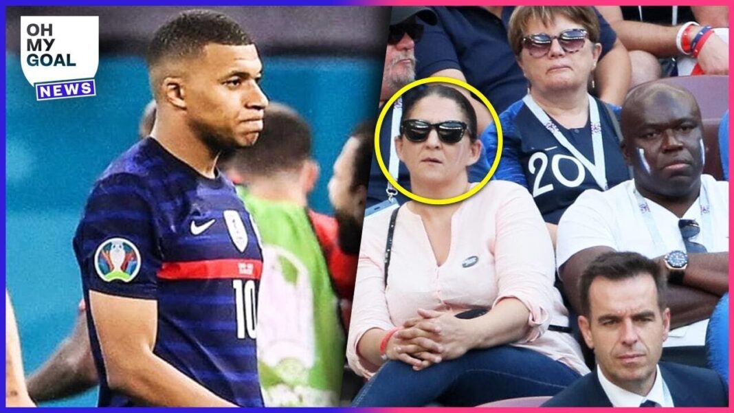 Du nouveau sur la mère de Kylian Mbappé Kylian Mbappé avec sa mère lors d'un match de football.