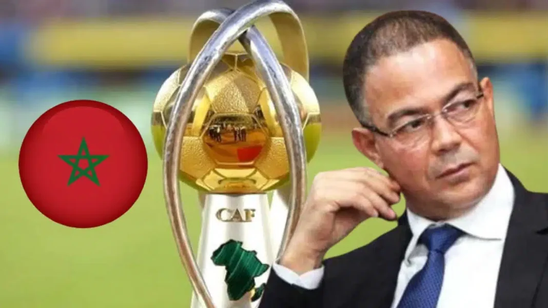 CHAN 2022/Algérie : Lekjaa trouve regrettable le fait de priver le Maroc de défendre son titre. Le président de la CAF en discussion lors d'un événement sportif.