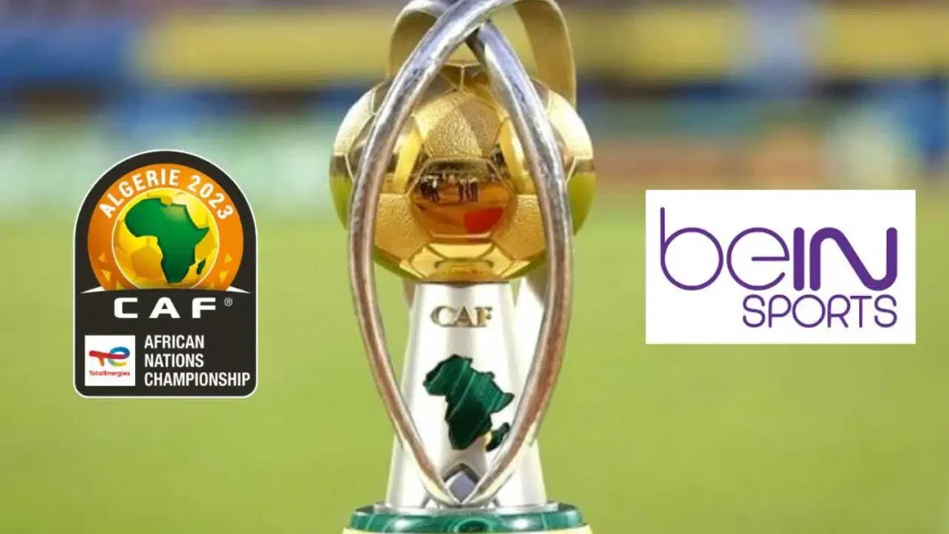 Trophée de la CAN 2022 avec logo CAF et beIN Sports.