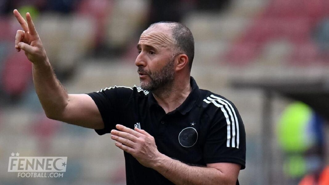 Djamel Belmadi en action lors d'un match Djamel Belmadi, entraîneur de l'équipe d'Algérie, donne des instructions sur le terrain.