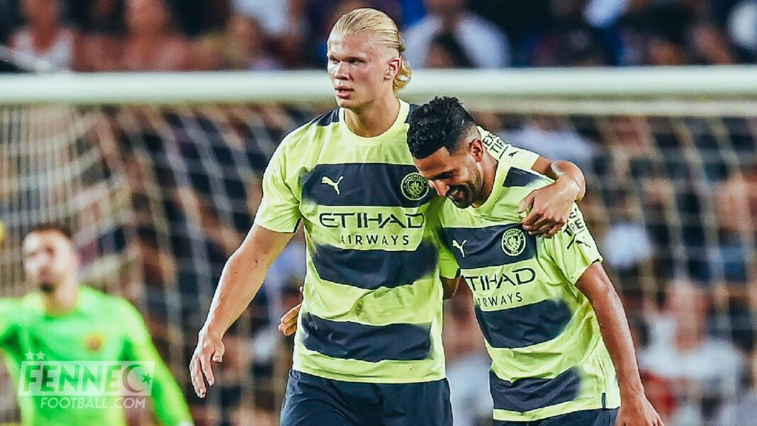 Voici la nouvelle fortune astronomique d’Erling Haaland, coéquipier de Mahrez Haaland et Mahrez en action lors d'un match de football.