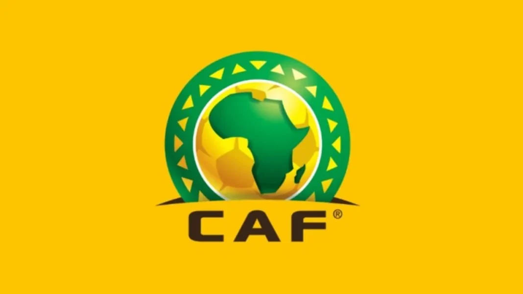 Logo de la CAF avec le continent africain en vert et jaune.