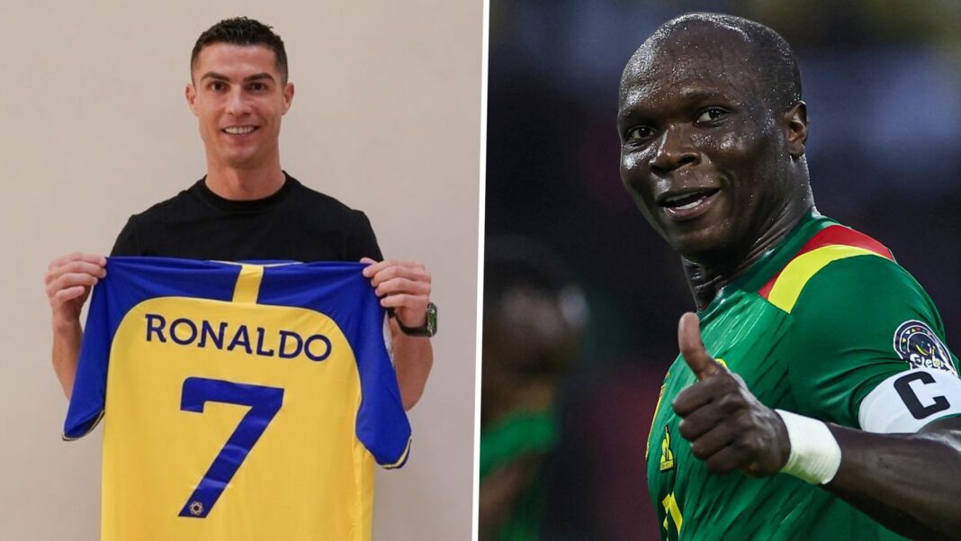 Cristiano Ronaldo et Aboubakar en action Cristiano Ronaldo et Aboubakar lors d'un match de football.