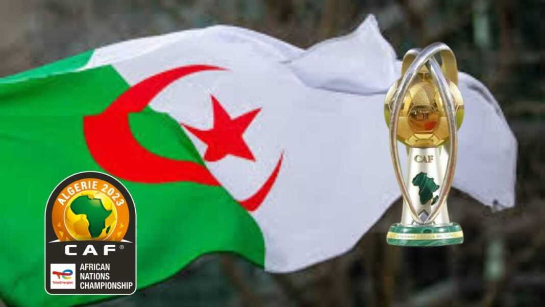 Incroyable ! Les médias marocains sèment le trouble par ce geste ridicule Drapeau algérien avec trophée de la CAF en arrière-plan.