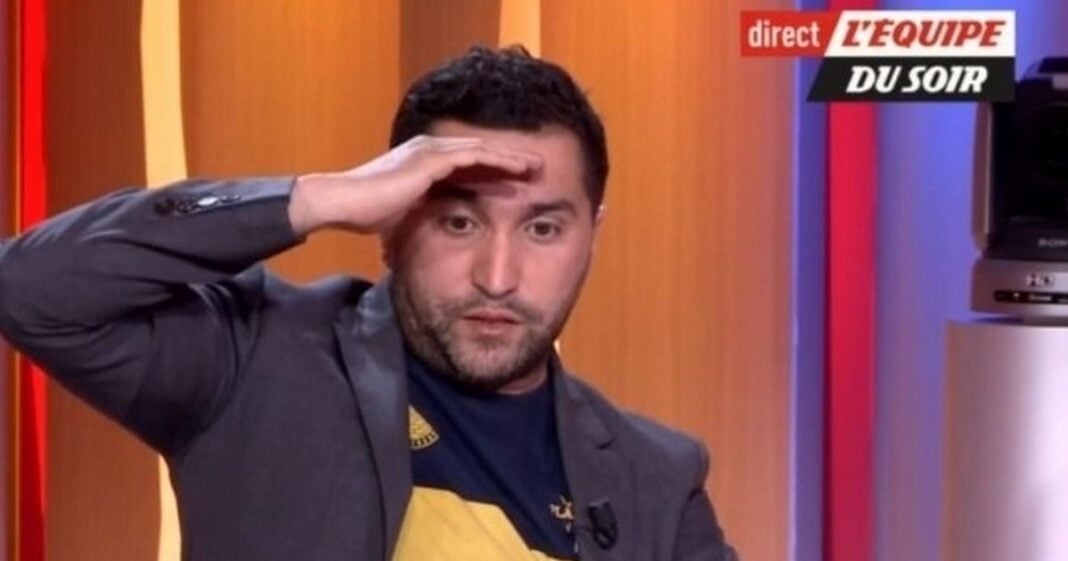 Nabil Djellit lors d'une émission sportive, expression de surprise ou déception.