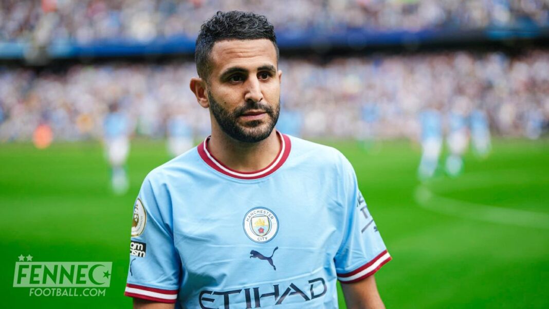 Coup de Tonnerre ! Pep Guardiola prépare un vilain coup contre Riyad Mahrez Riyad Mahrez en action sur le terrain de football en tenue Manchester City.