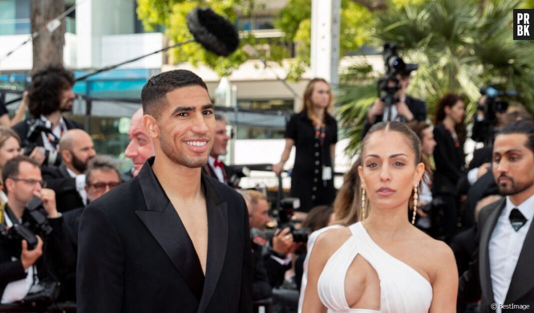 Achraf Hakimi et une femme lors d'une cérémonie de remise de prix.