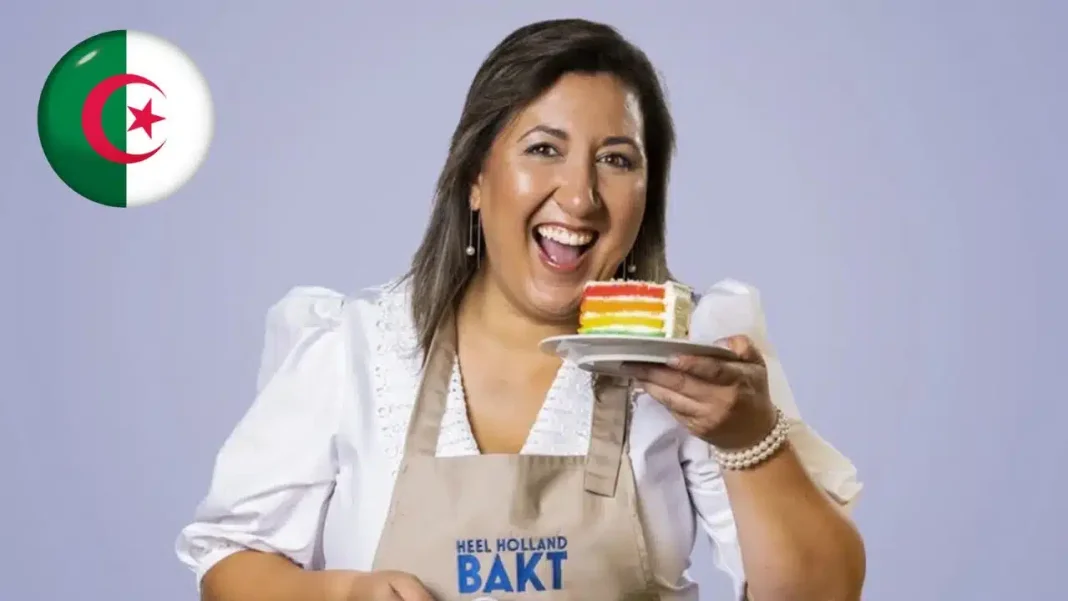Concours « Meilleur Pâtissier dans sa version néerlandaise » : Encore une algérienne au panthéon Femme algérienne souriante avec gâteau coloré pour concours pâtissier.