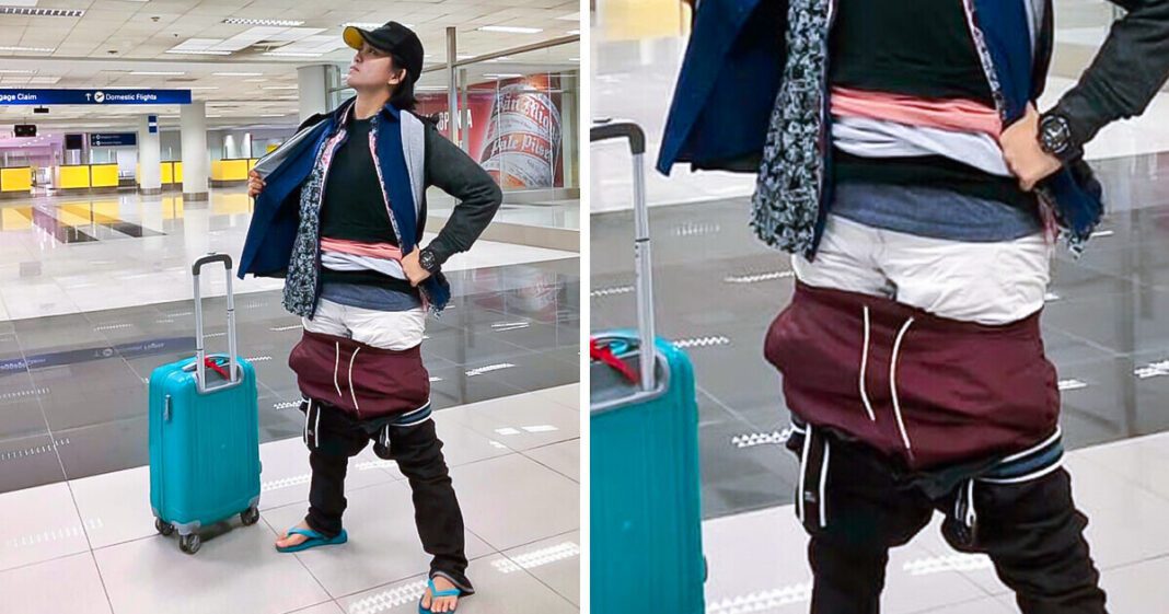 France : une étudiante algérienne porte plus de 2 kilos de vêtements pour éviter de payer un supplément de bagages Jeune femme avec valise à l'aéroport en France.