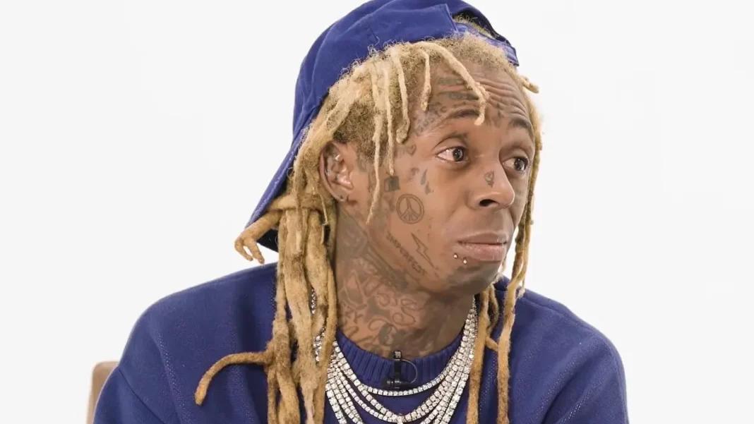 Lil Wayne, le rappeur américain a perdu la mémoire Rappeur avec dreadlocks et tatouages, expression surprise.