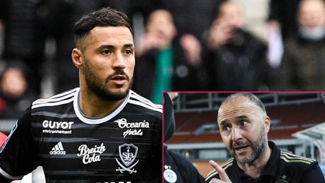 EN : Énorme coup de pression de Djamel Belmadi à Youcef Belaili Youcef Belaili lors d'une rencontre sportive sous pression de l'entraîneur Djamel Belmadi.