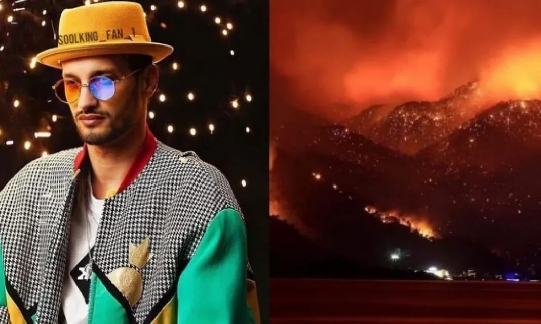 Incendies en Algérie : Soolking pose un geste noble Soolking pose avec un fond de feux de forêt en Algérie.