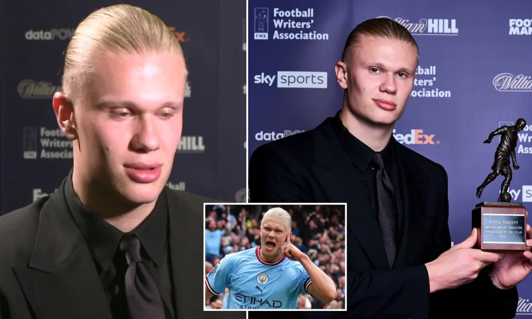 Haaland élu meilleur joueur de la Premier League Haaland recevant le prix du meilleur joueur de la Premier League.