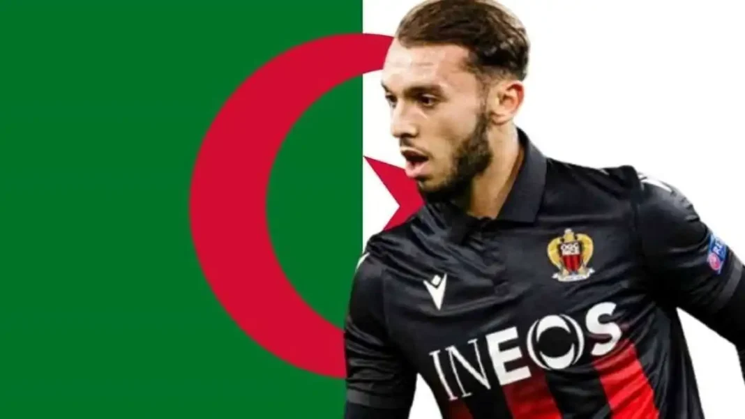 Transfert en Équipe d’Algérie: Amine Gouiri passe à la vitesse supérieure Amine Gouiri, joueur de football algérien, en pleine action sur le terrain.
