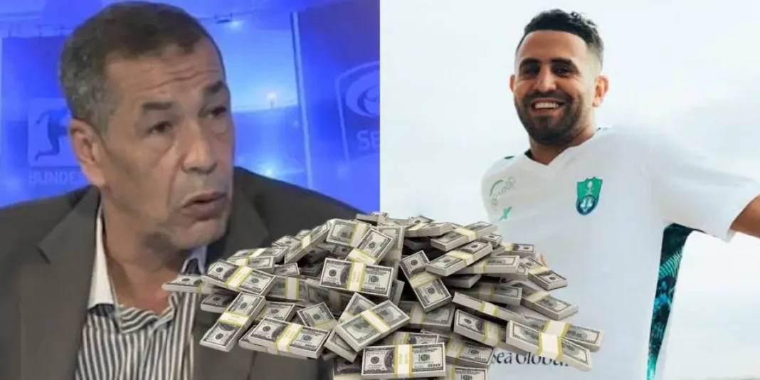 Benchikh critique sévèrement Mahrez pour sa prise de poids Riyad Mahrez en tenue d'équipe, sourire, avec un fond de ciel nuageux.