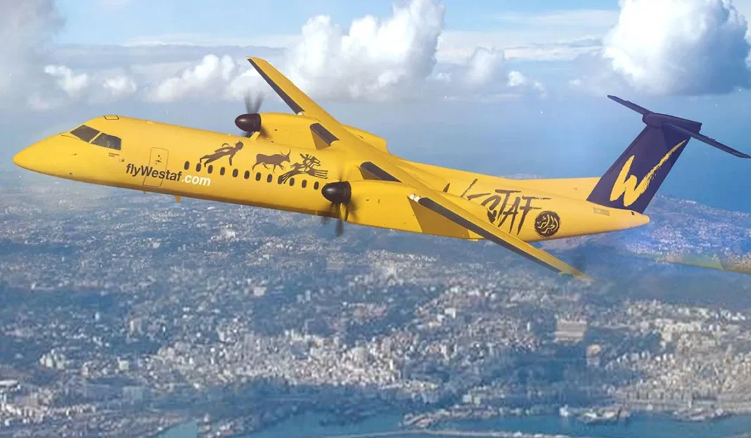 Avion privé jaune avec logo W et inscription flyWestaf.com.