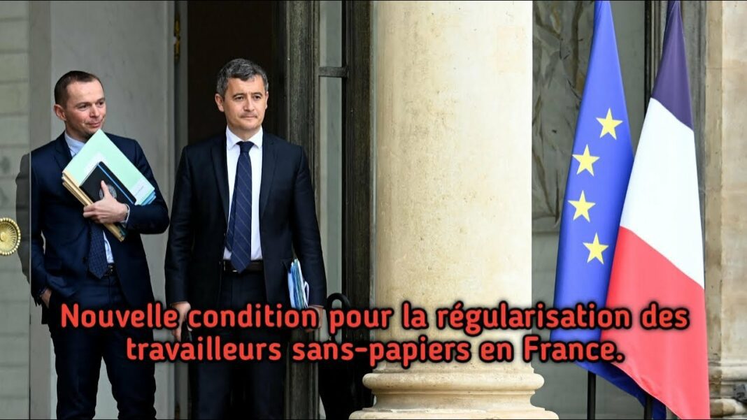 Régularisation des sans-papiers sans emploi en France : les voies possibles Deux hommes en costume devant un bâtiment avec drapeaux français et européen.