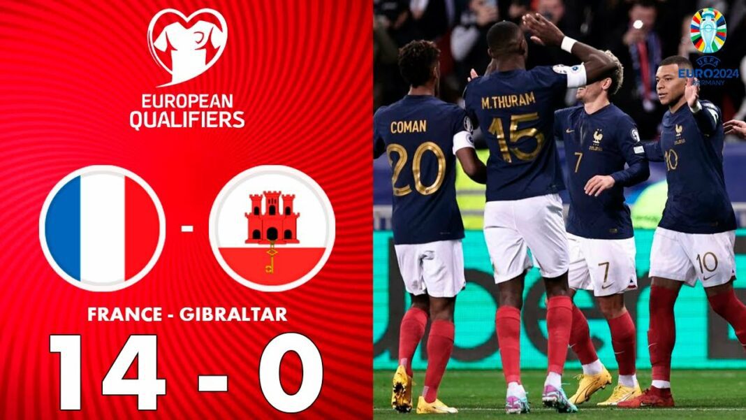 Victoire de la France contre Gibraltar Équipe de France de football célébrant leur victoire 14-0 contre Gibraltar.