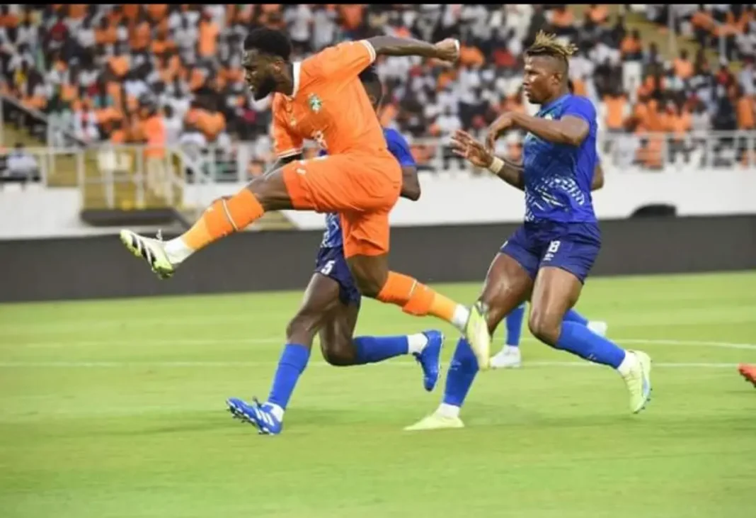 CAN 2023 Préparation : La Côte d’Ivoire domine la Sierra Leone 5-1 Joueur ivoirien en action lors d'un match de football.