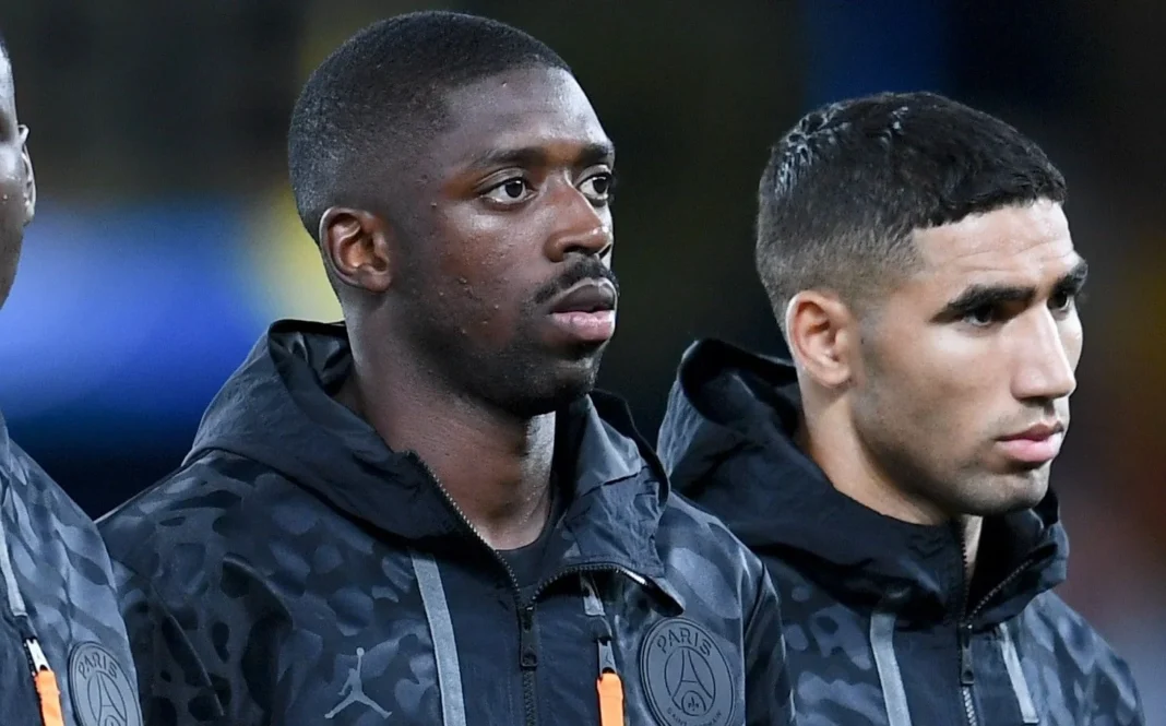 Ousmane Dembélé lors d'un match Ousmane Dembélé en tenue de sport lors d'un match de football.