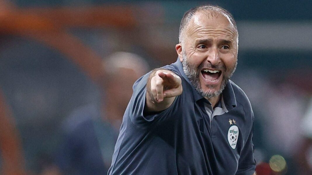Djamel Belmadi en action Djamel Belmadi, entraîneur de l'Algérie, encourage son équipe lors d'un match.