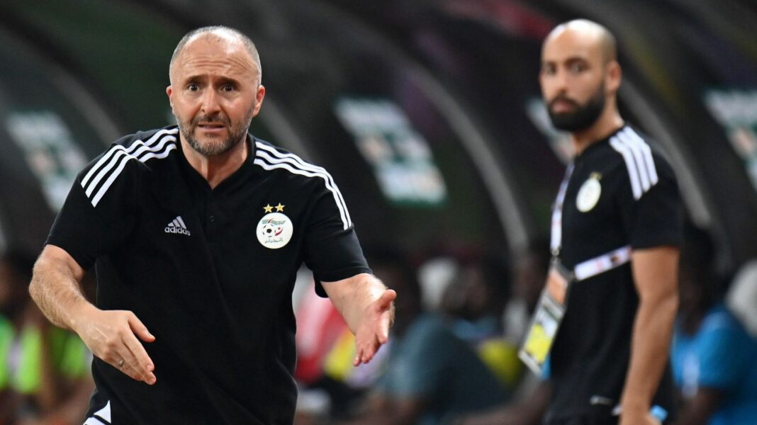 Qui succédera à Djamel Belmadi ? : La course au trône des Verts continue Entraîneur de football algérien sur le terrain lors d'un match.