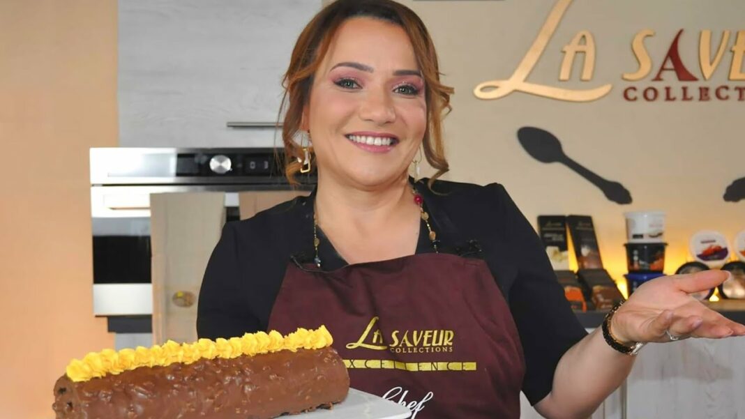 Affaire Sherazade Laoudedj : Quand la gastronomie devient sujet de polémique Chef avec un gâteau au chocolat décoré de fleurs jaunes.