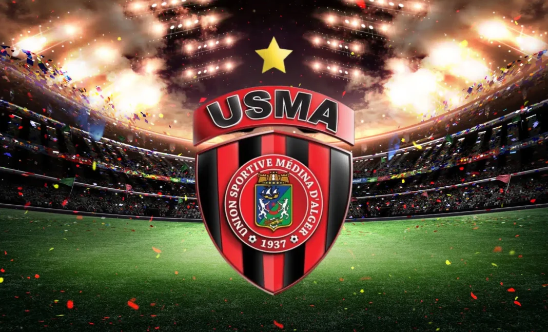 La CAF toujours sur le dos de l’Algérie : l’USMA reçoit un dernier avertissement Logo de l'USMA dans un stade avec feux d'artifice et confettis.